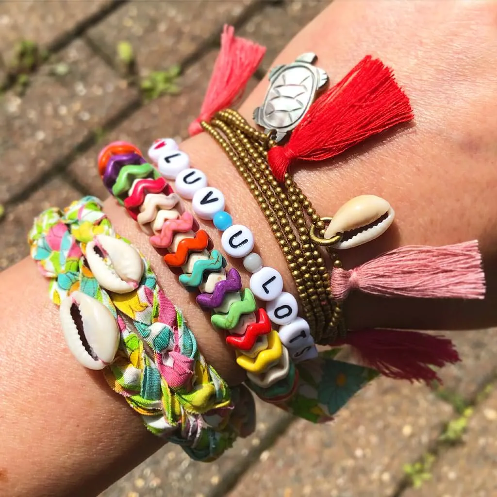 Treasure Island Charms Multi Tassel Beaded Cord Bracelet